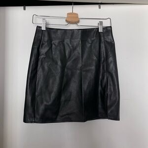 Mini black leather skirt